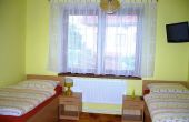 Žlutý apartmán - místnost s oddělenými postelemi